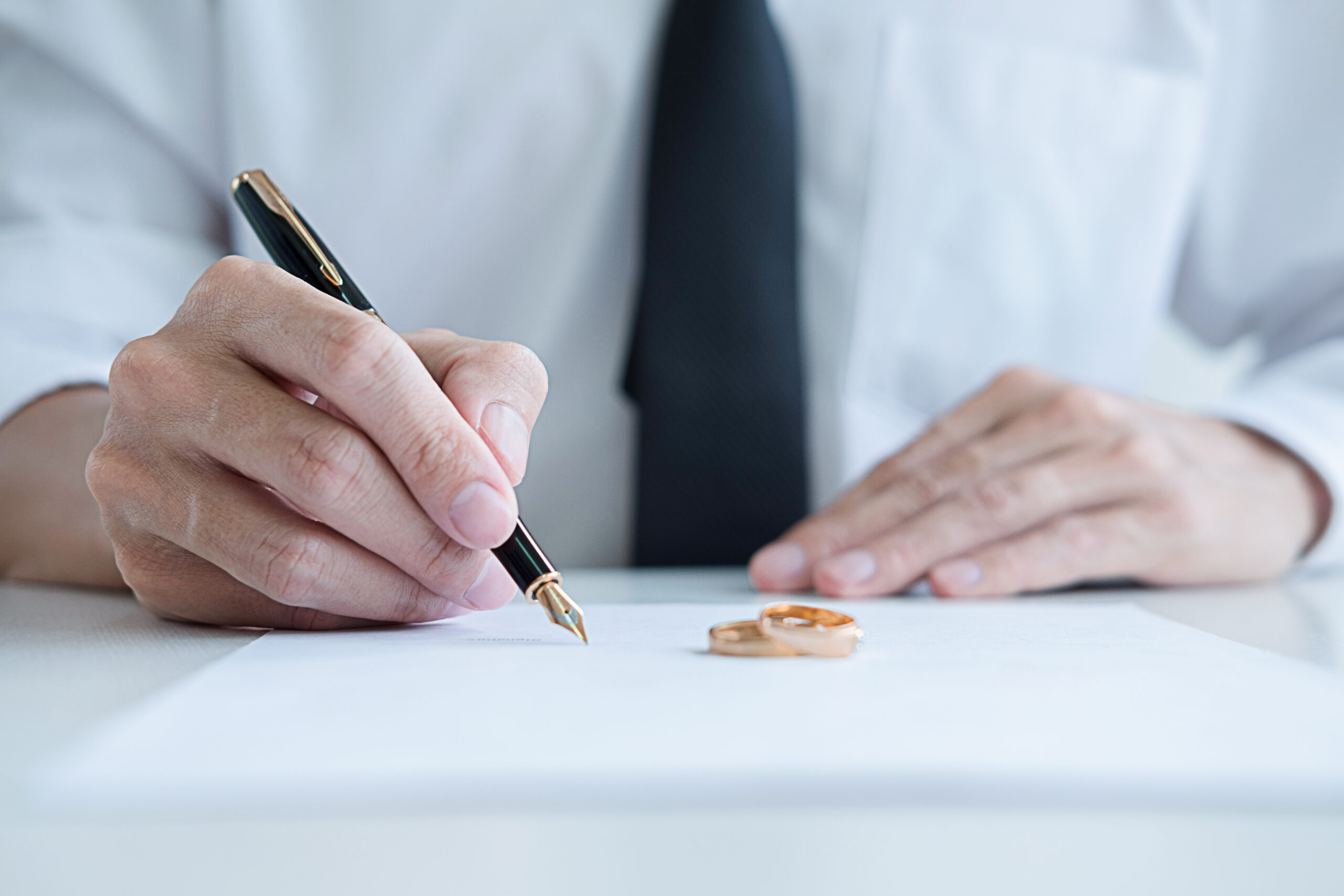 Signing paperwork - Law Office of Amanda J. Cook